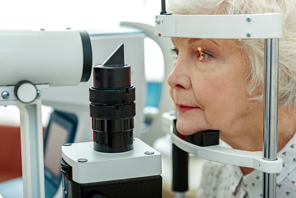 senior being examined for macular degeneration